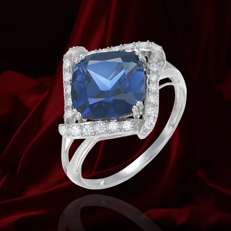 Elegantly Framed Blue Sapphire Ring