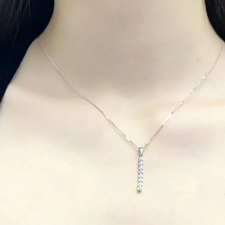 Journey diamond drop pendant in White Gold