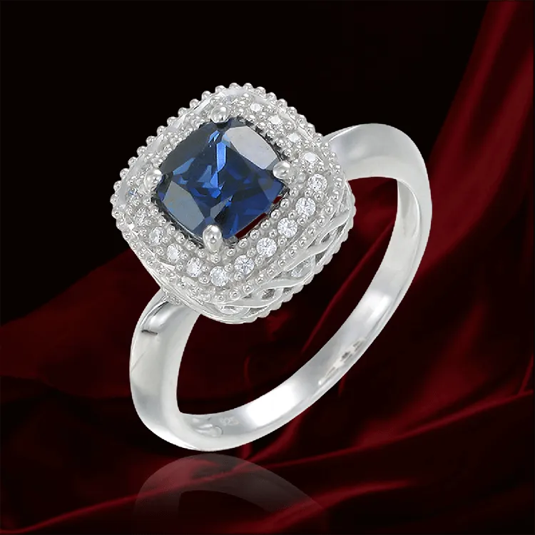 Sapphire Ring with Radiant Accents