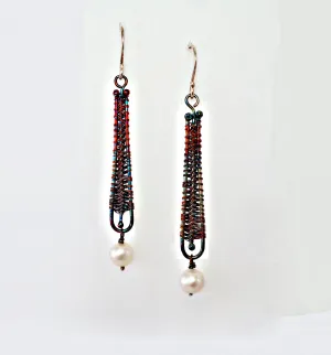 Woven silver earrings with pearl drop